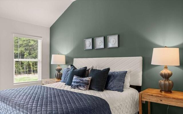 1260 Riverstone Road Jonesboro, GA 30236 - Photo 29 of 45 a bedroom with a bed and a window