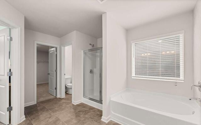 1260 Riverstone Road Jonesboro, GA 30236 - Photo 30 of 45 a bathroom with a bathtub and a shower