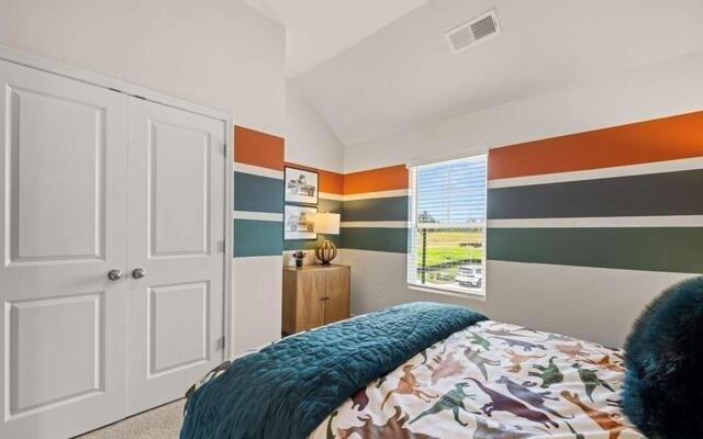 1260 Riverstone Road Jonesboro, GA 30236 - Photo 41 of 45 a bedroom with a bed and a closet