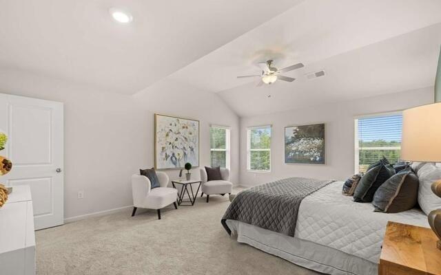 1260 Riverstone Road Jonesboro, GA 30236 - Photo 43 of 45 a bedroom with a bed and a chandelier