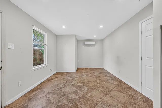 a view of an empty room and window