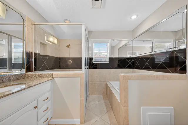 a view of a kitchen with a sink and wooden floor