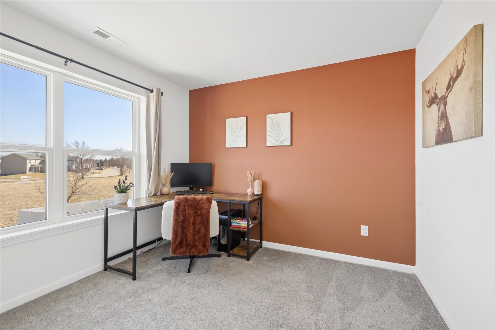 602 Apple Valley Road Harvard, IL 60033 - Photo 13 of 24 a workspace with furniture and a window