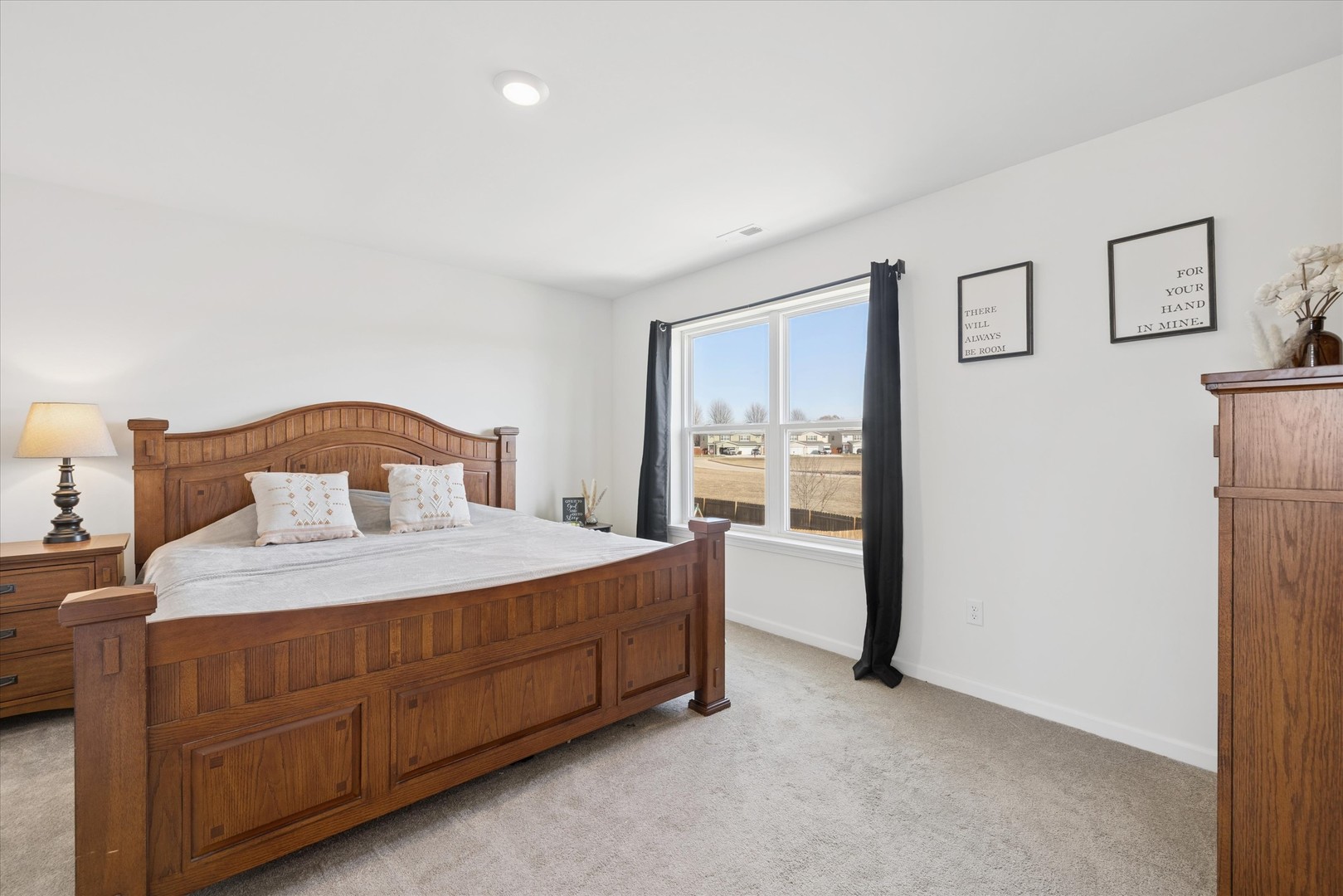 602 Apple Valley Road Harvard, IL 60033 - Photo 14 of 24 a bedroom with a bed and a cabinets