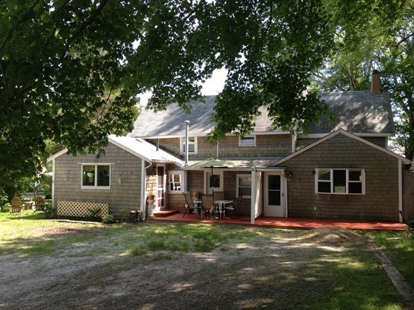4 Bruce Street Wareham, MA 02532 - Photo 13 of 30 a front view of a house with a garden