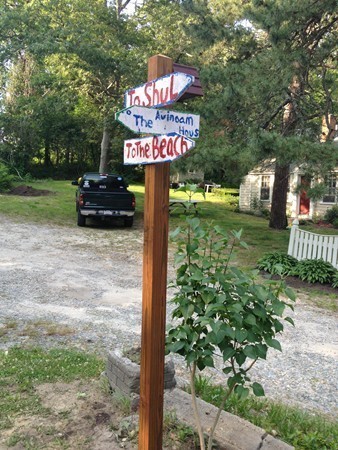 4 Bruce Street Wareham, MA 02532 - Photo 16 of 30 a view of a street sign under a large tree
