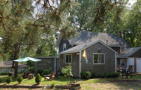4 Bruce Street Wareham, MA 02532 - Photo 20 of 30 a front view of a house with a yard