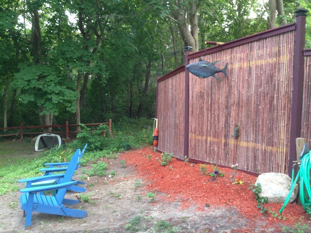 4 Bruce Street Wareham, MA 02532 - Photo 25 of 30 a backyard of a house with seating space