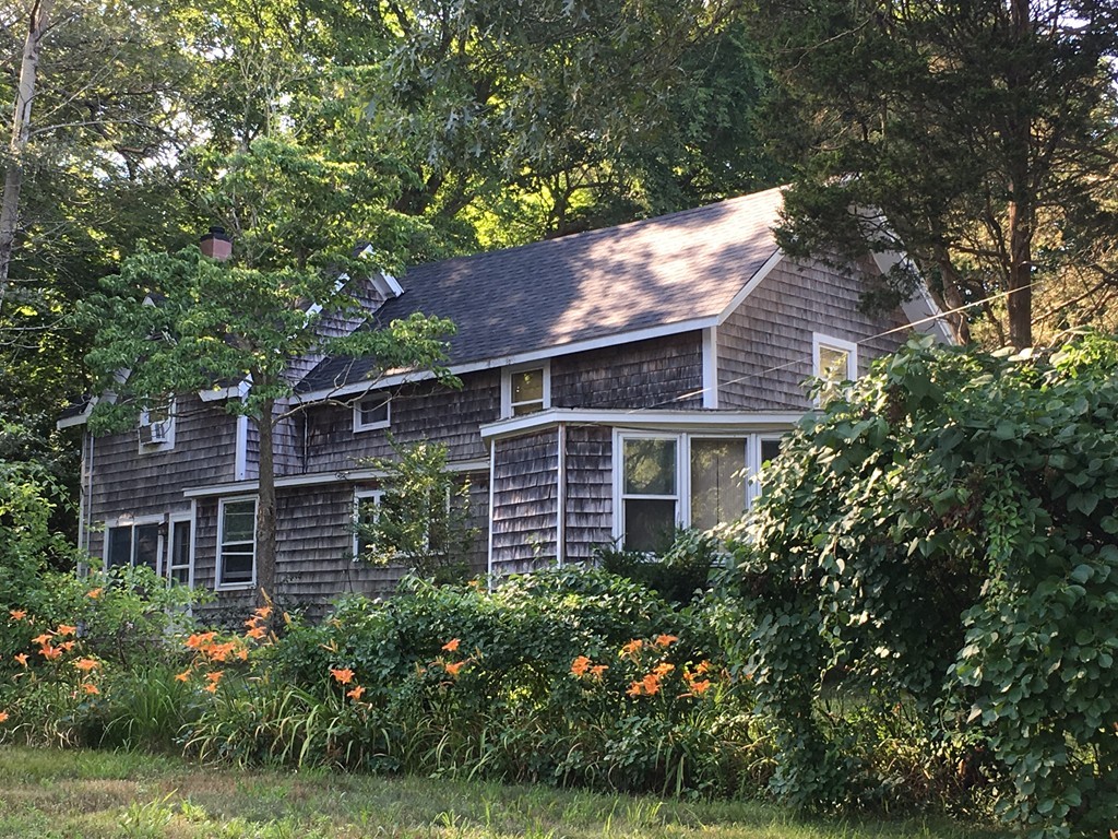 4 Bruce Street Wareham, MA 02532 - Photo 27 of 30 front view of a house with a garden