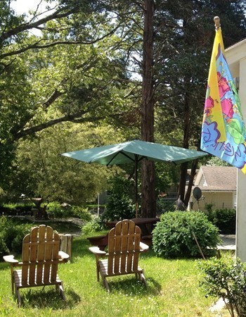 4 Bruce Street Wareham, MA 02532 - Photo 3 of 30 a view of backyard with swimming pool and outdoor seating