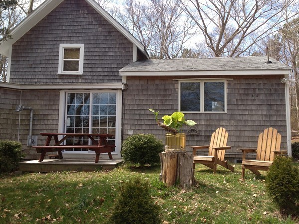 4 Bruce Street Wareham, MA 02532 - Photo 4 of 30 a backyard of a house with seating space