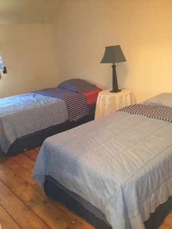 4 Bruce Street Wareham, MA 02532 - Photo 6 of 30 a bedroom with a bed and a lamp