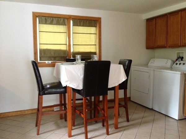 4 Bruce Street Wareham, MA 02532 - Photo 7 of 30 a view of a dining room with furniture and a window