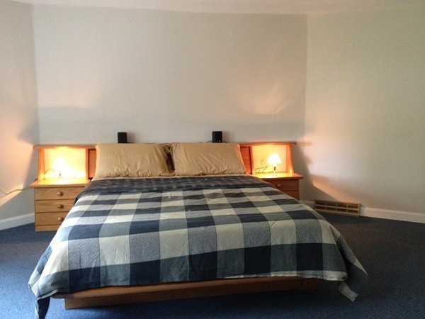 4 Bruce Street Wareham, MA 02532 - Photo 8 of 30 a bedroom with a bed and window