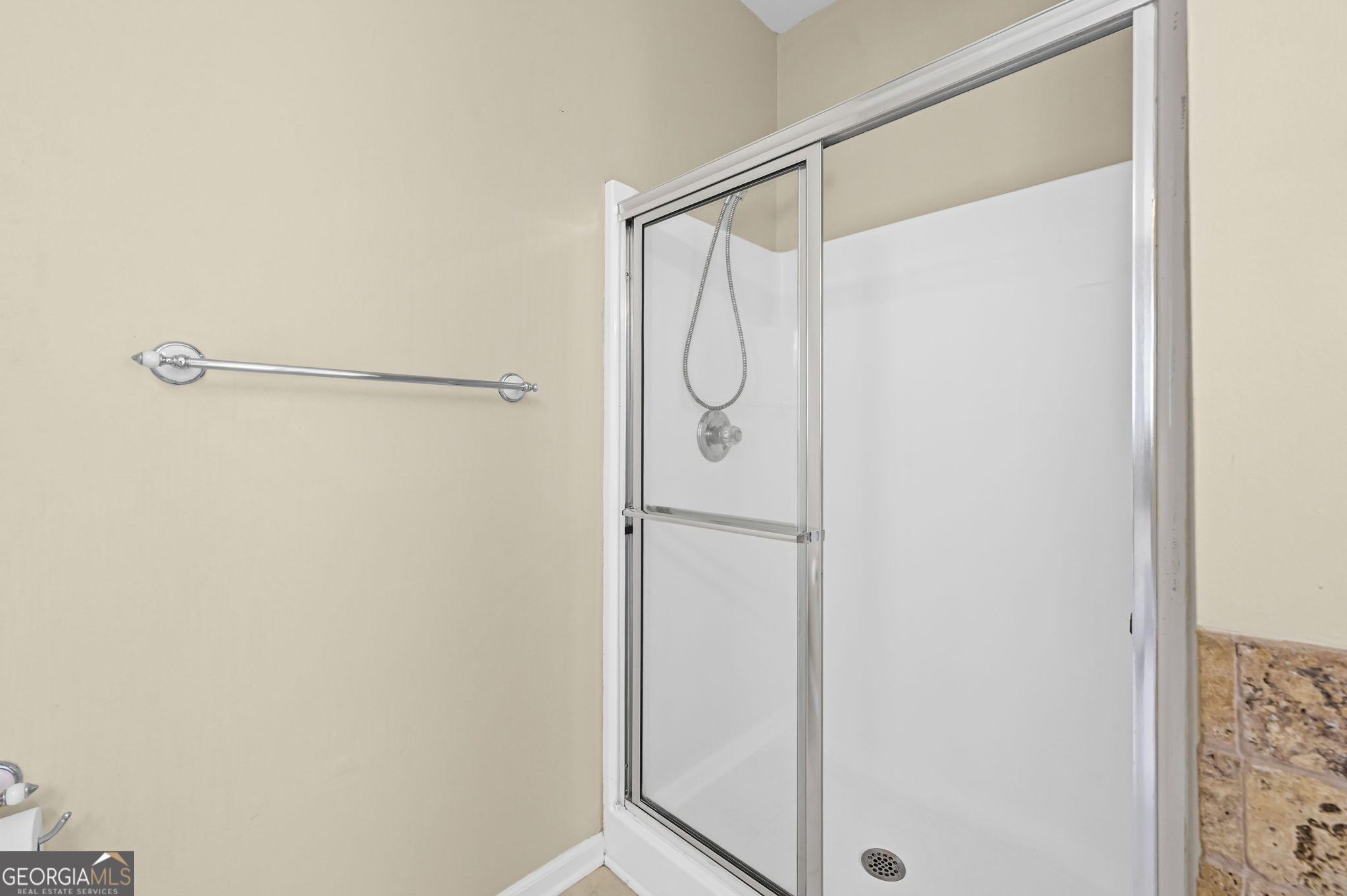 21 Verandah View Newnan, GA 30265 - Photo 19 of 39 a bathroom with a glass shower door