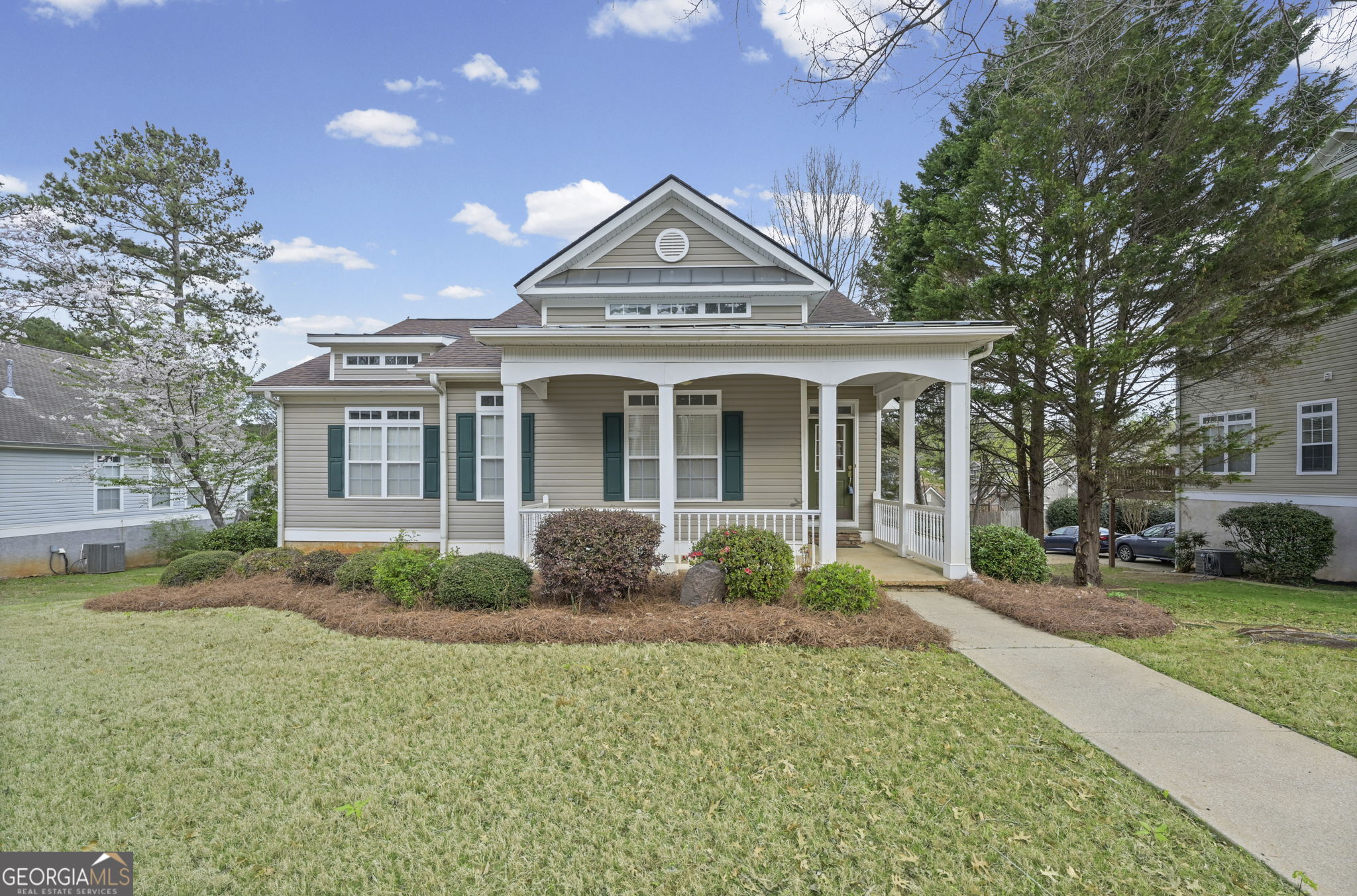 21 Verandah View Newnan, GA 30265 - Photo 2 of 39 a front view of a house with garden
