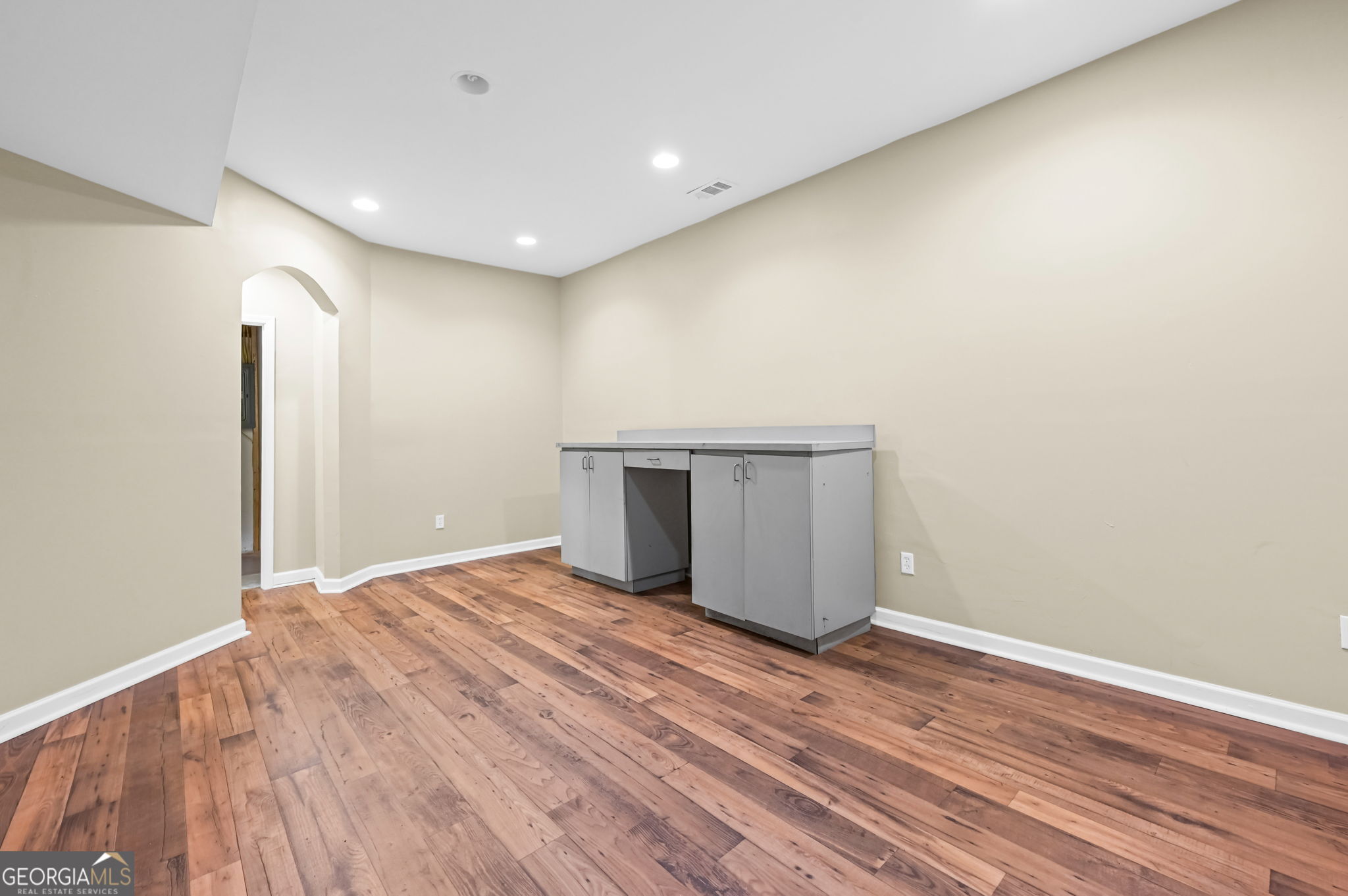 21 Verandah View Newnan, GA 30265 - Photo 35 of 39 a view of an empty room with wooden floor and a window