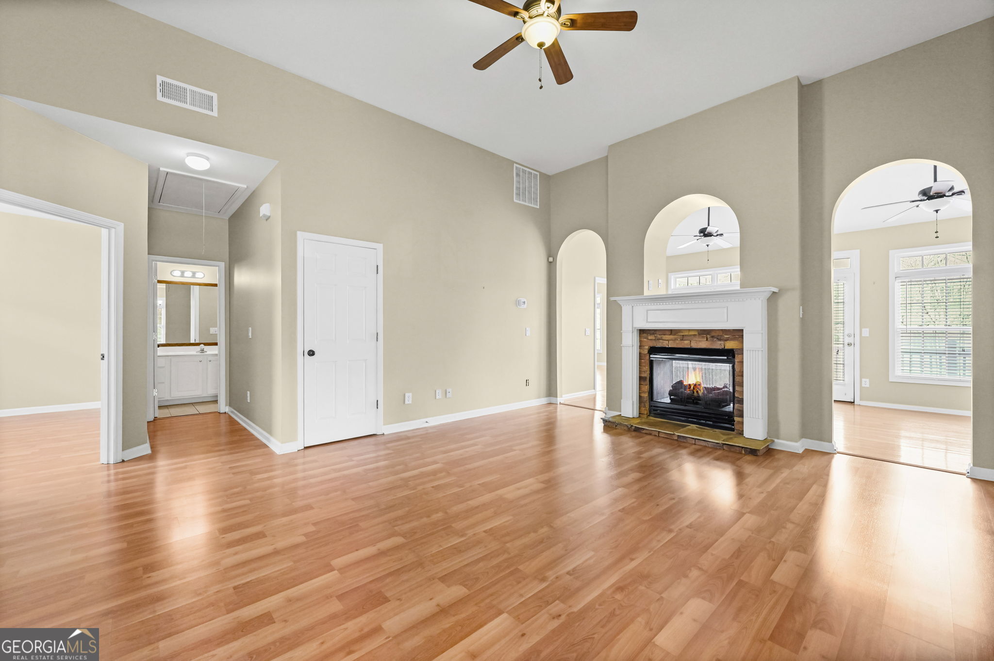 21 Verandah View Newnan, GA 30265 - Photo 7 of 39 a view of empty room with wooden floor and fireplace