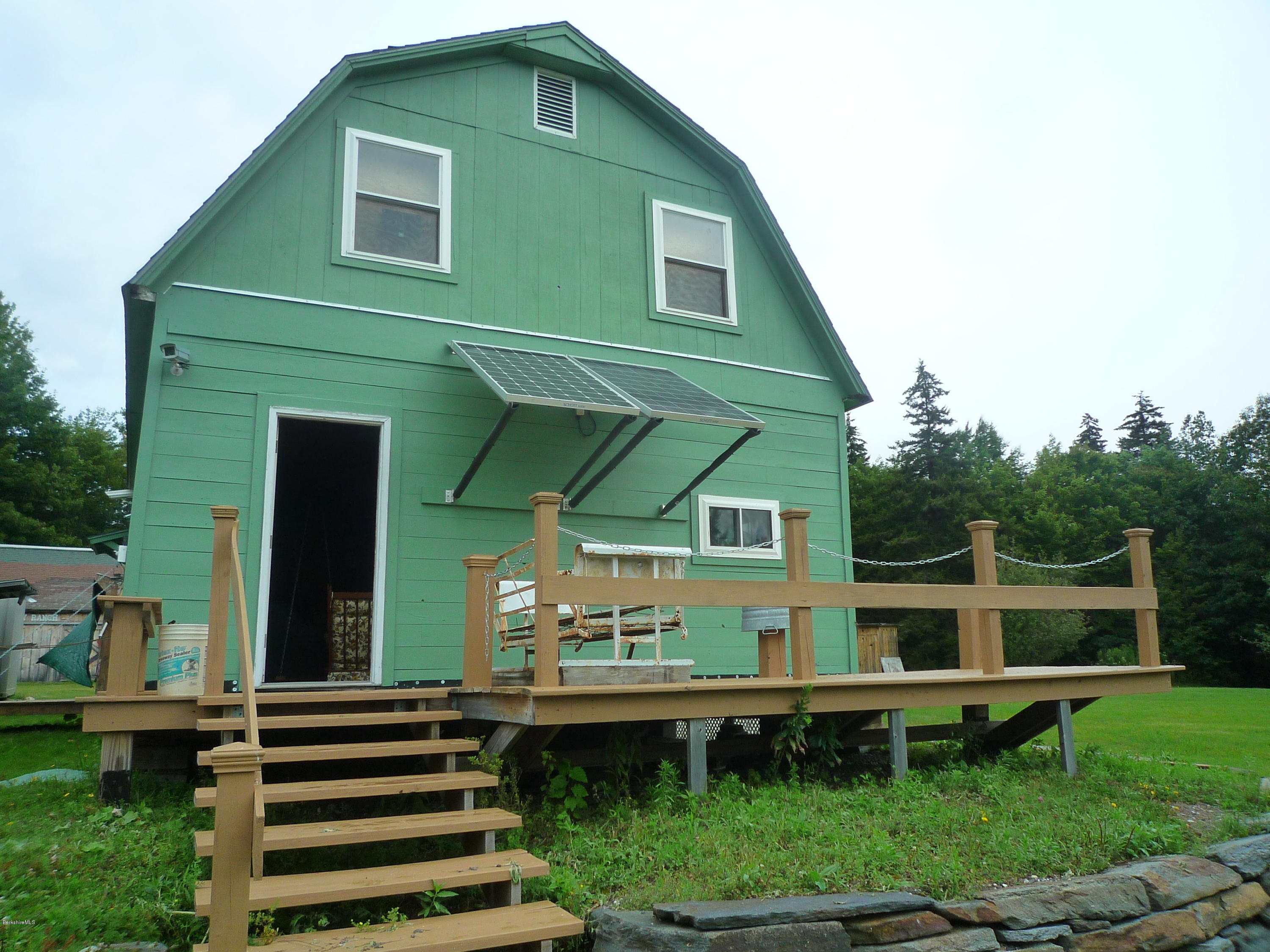900 Risky Ranch Road Stamford, VT 05352 - Photo 2 of 15 a front view of a house with a yard