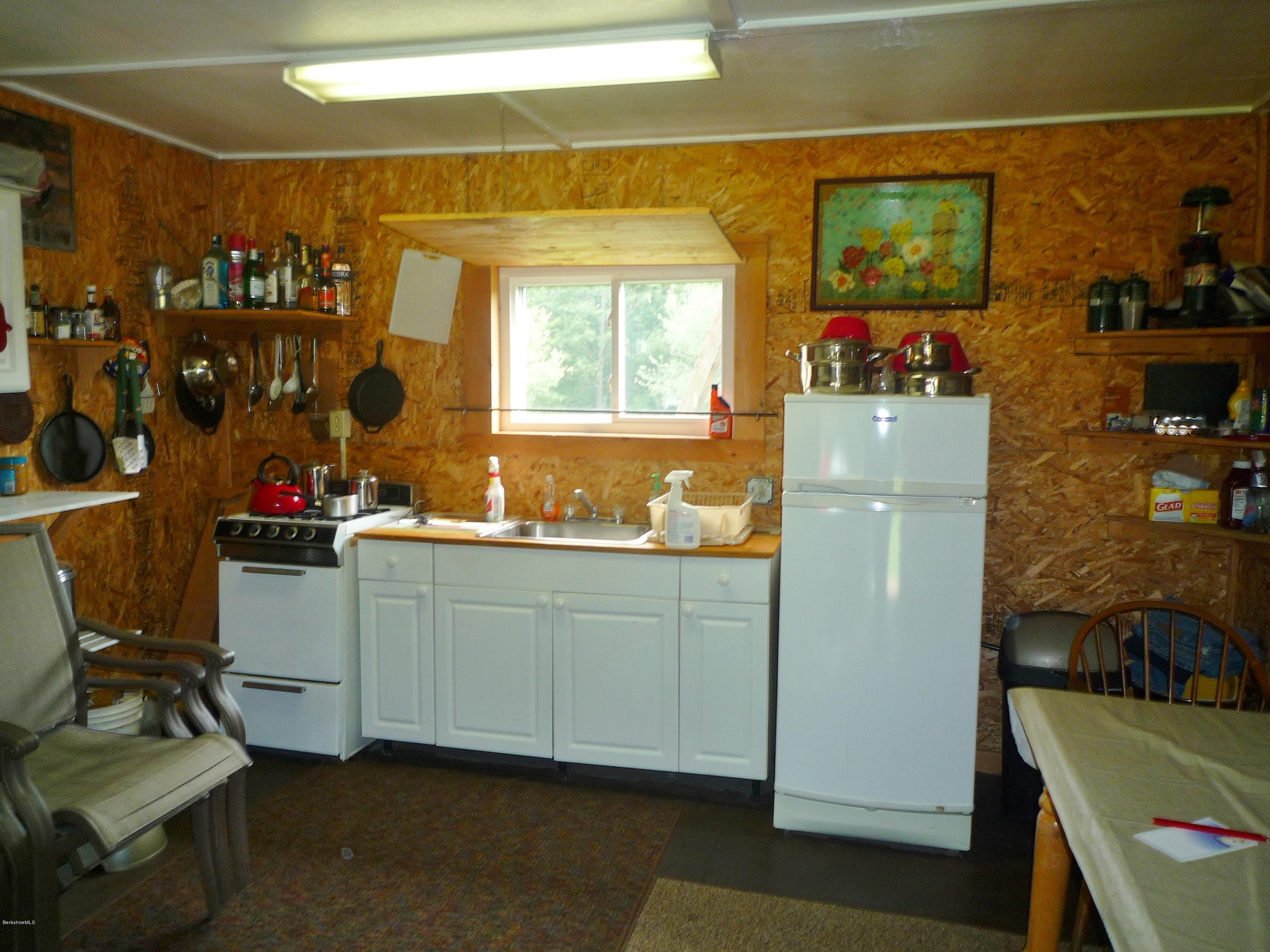 900 Risky Ranch Road Stamford, VT 05352 - Photo 11 of 15 a room with storage and utility