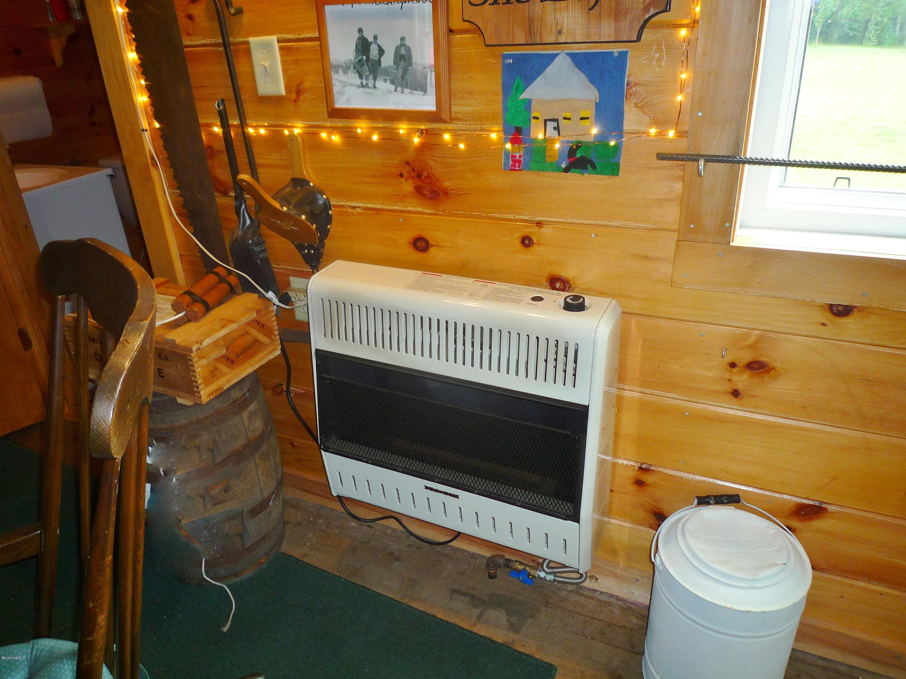 900 Risky Ranch Road Stamford, VT 05352 - Photo 14 of 15 a bathroom with a toilet and a sink
