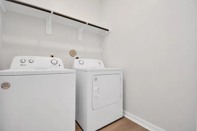 a view of empty room with ceiling fan