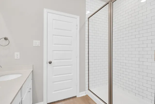 a bathroom with a bathtub and a sink
