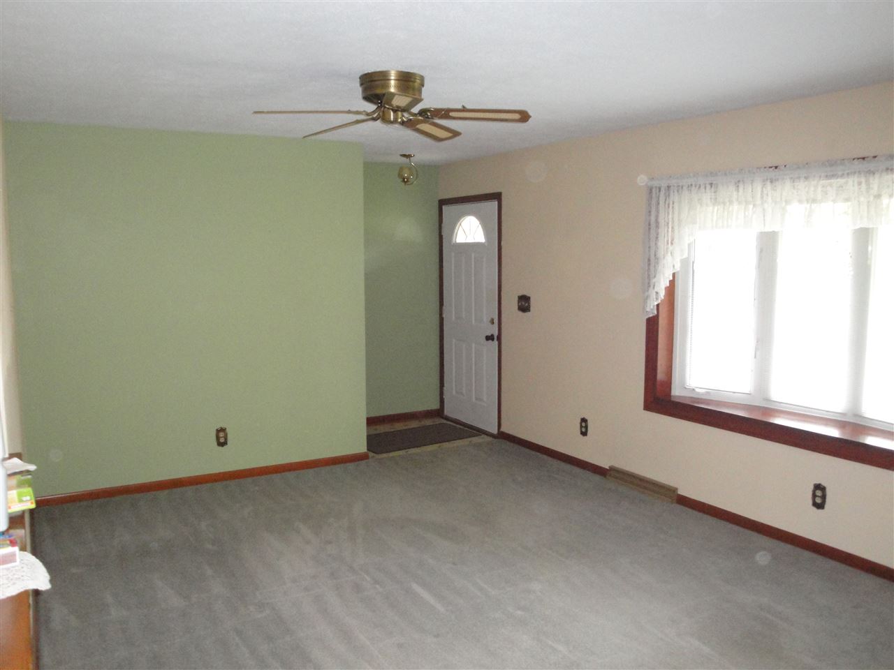7155 Ralph Road Rockford, IL 61109 - Photo 5 of 18 a view of an empty room with a window