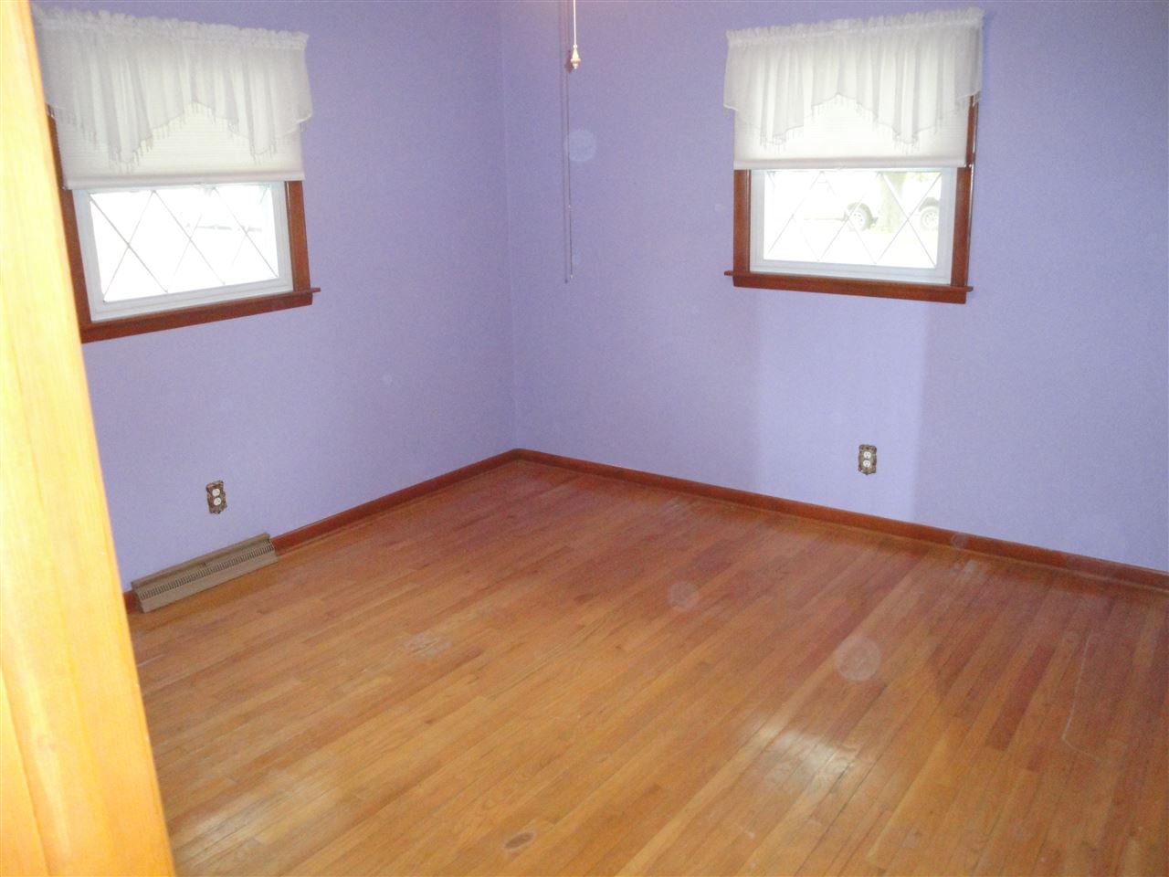 7155 Ralph Road Rockford, IL 61109 - Photo 8 of 18 an empty room with windows