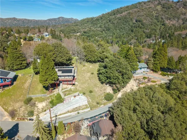 an aerial view of residential house with outdoor space