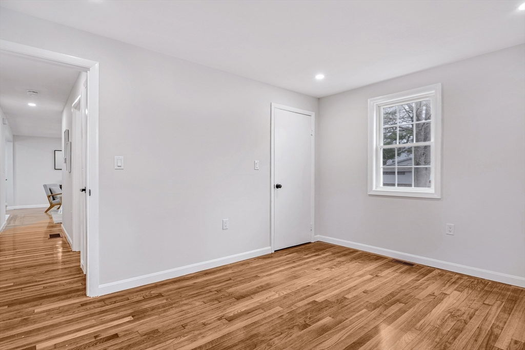 76 Sunset Drive Brockton, MA 02301 - Photo 12 of 32 a view of empty room with wooden floor