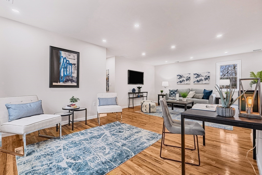 76 Sunset Drive Brockton, MA 02301 - Photo 19 of 32 a living room with furniture and a flat screen tv