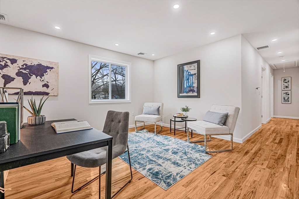 76 Sunset Drive Brockton, MA 02301 - Photo 22 of 32 a living room with furniture and a table