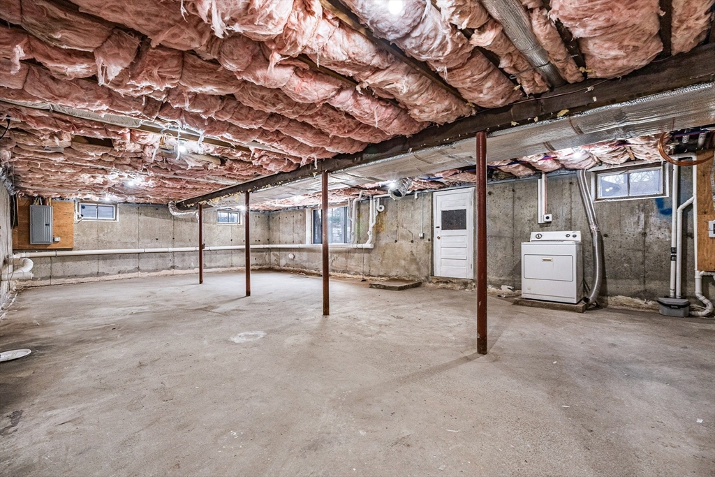 76 Sunset Drive Brockton, MA 02301 - Photo 31 of 32 a view of an empty room with a garage