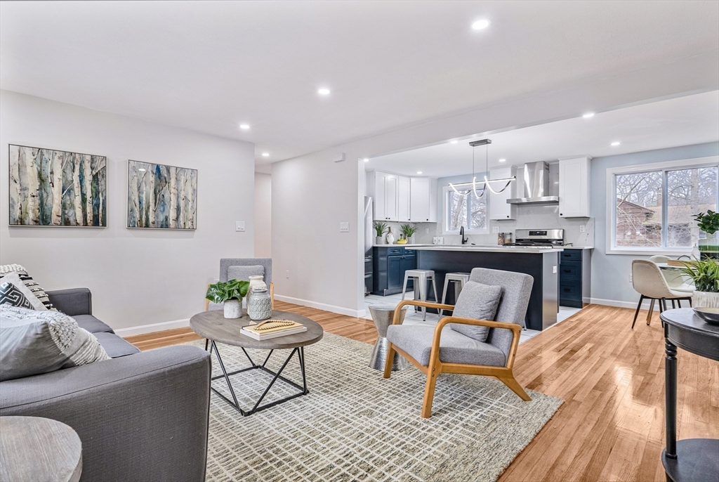 76 Sunset Drive Brockton, MA 02301 - Photo 7 of 32 a living room with furniture and a wooden floor