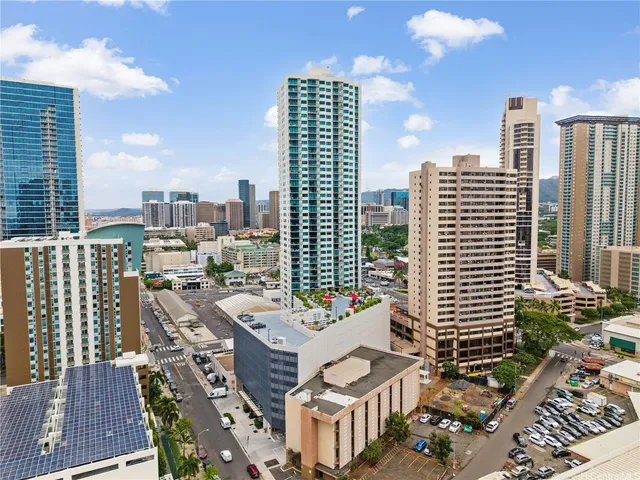 a view of a city with tall buildings