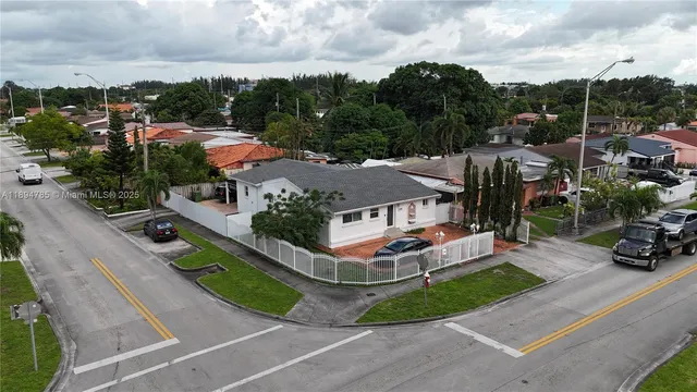 a aerial view of a house with porch