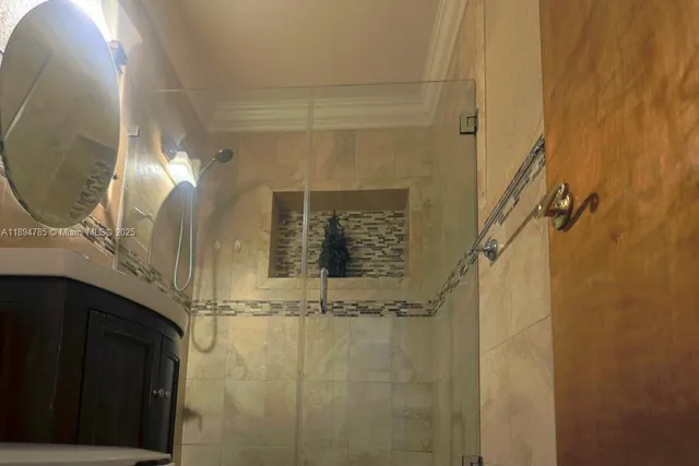 a bathroom with a sink and mirror