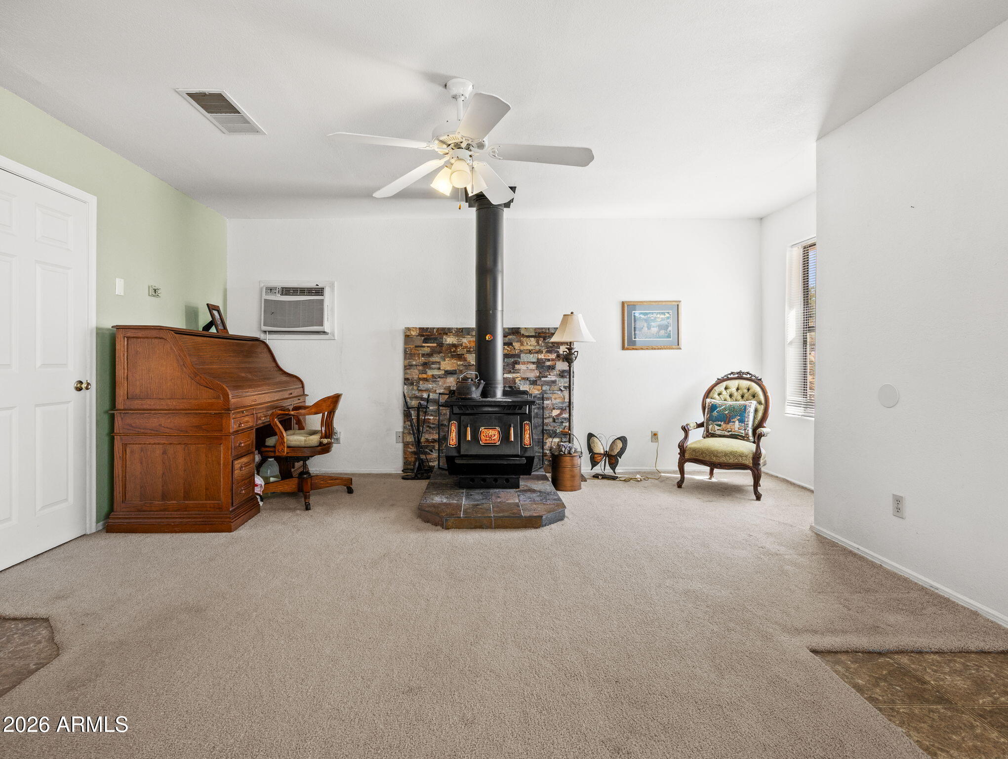 18420 Peeples Valley Road Peeples Valley, AZ 86332 - Photo 9 of 31 a living room with furniture and a lamp