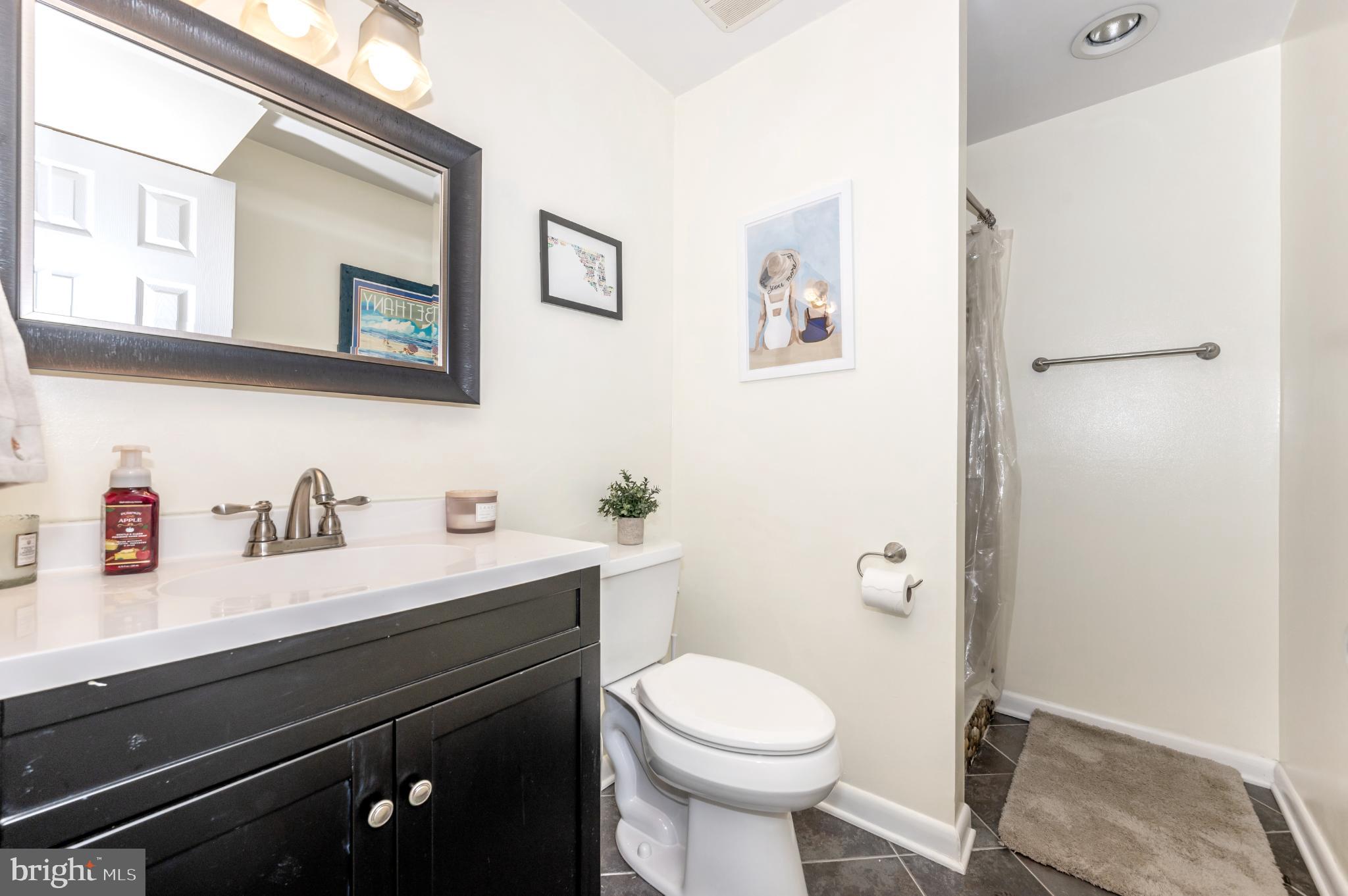 10453 Sweepstakes Road Damascus, MD 20872 - Photo 38 of 56 Modern bathroom with sleek finishes.