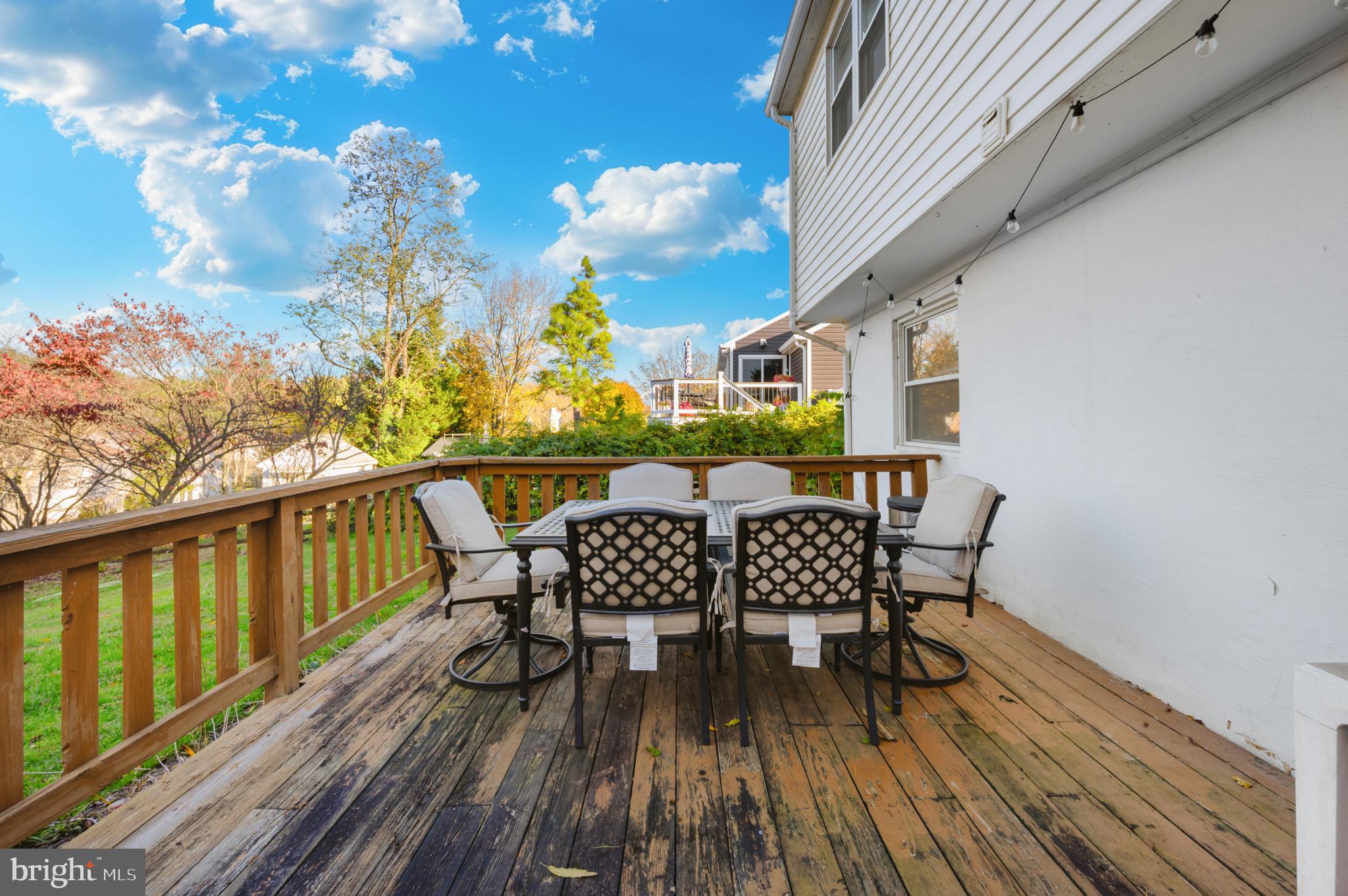 10453 Sweepstakes Road Damascus, MD 20872 - Photo 48 of 56 Sunny deck with scenic backyard views.