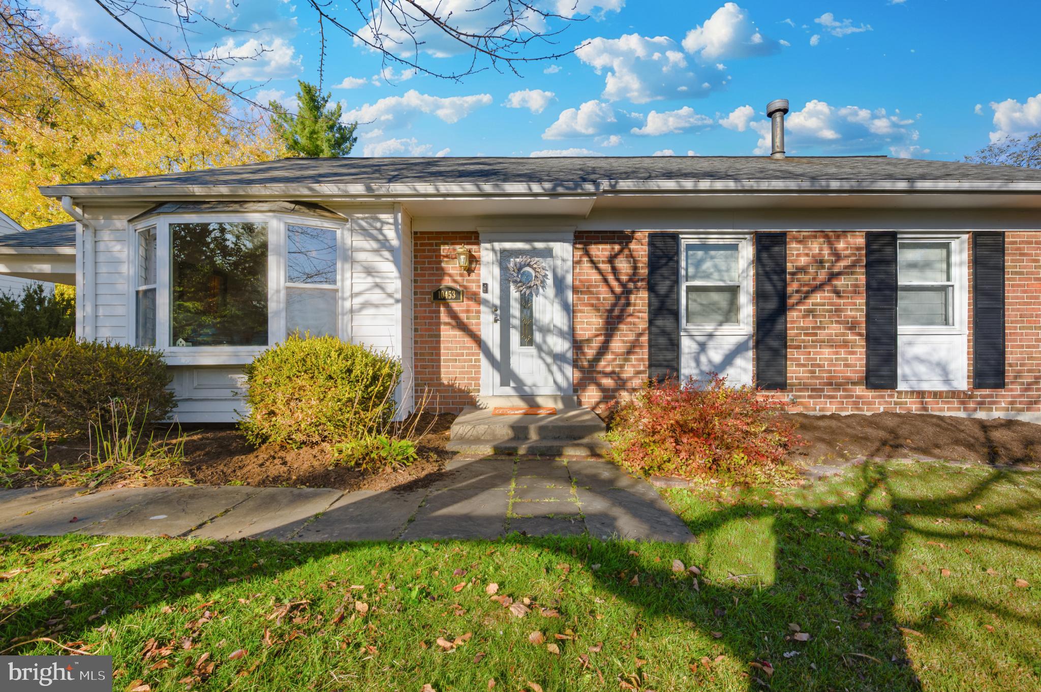 10453 Sweepstakes Road Damascus, MD 20872 - Photo 54 of 56 Charming brick home with lush landscaping.