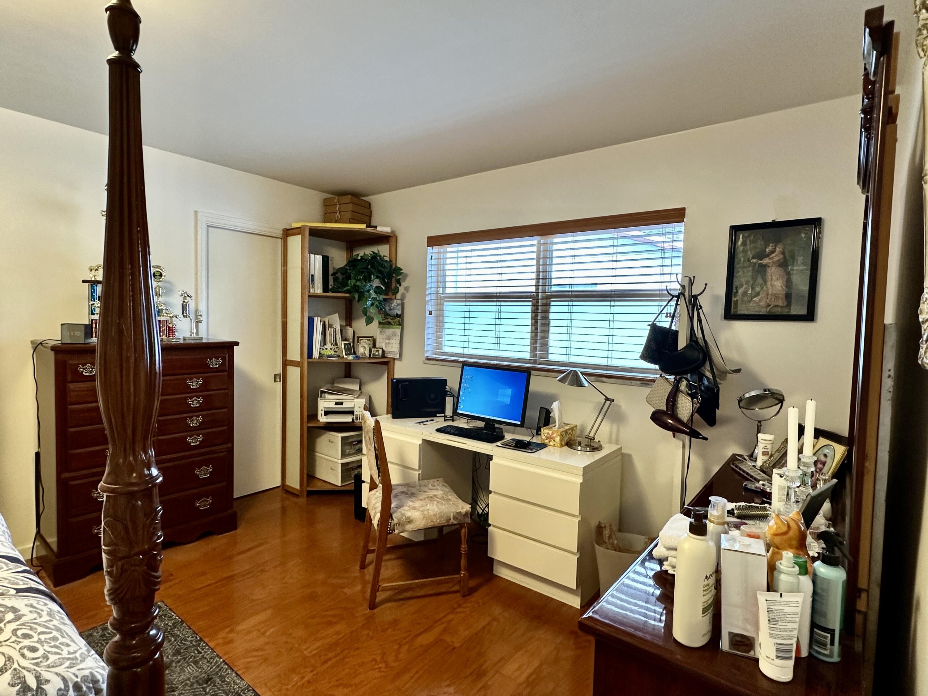 728 Ridge Road, Unit 35 Lantana, FL 33462 - Photo 14 of 35 a view of a workspace with furniture and a window