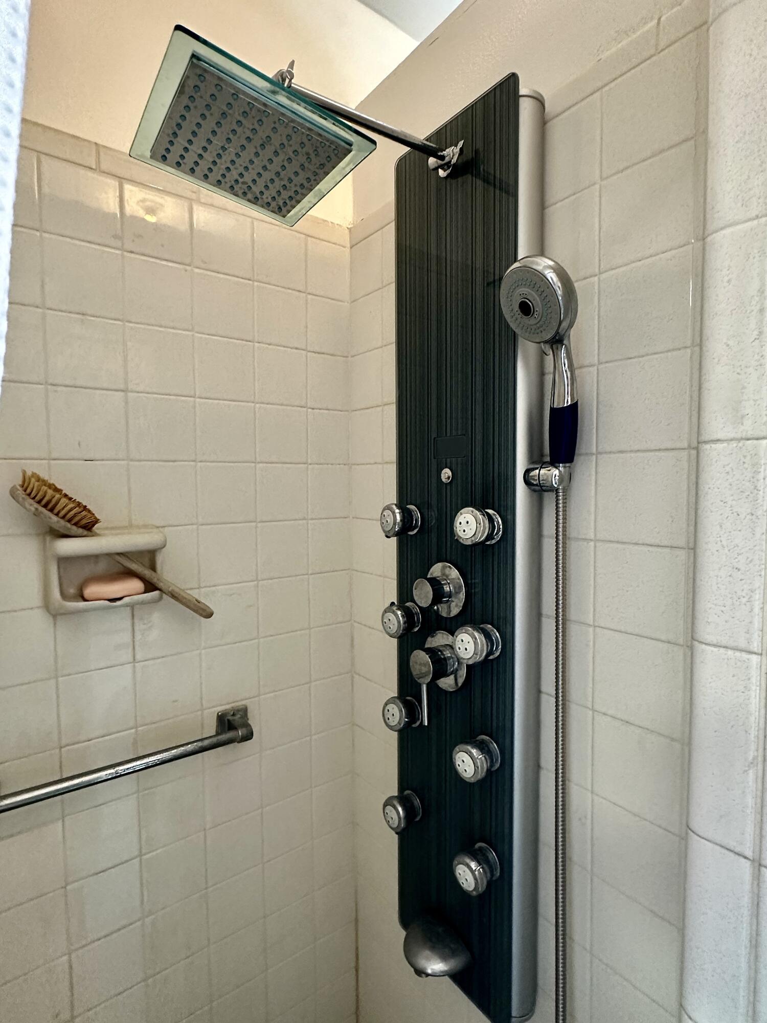 728 Ridge Road, Unit 35 Lantana, FL 33462 - Photo 21 of 35 a bathroom with a shower