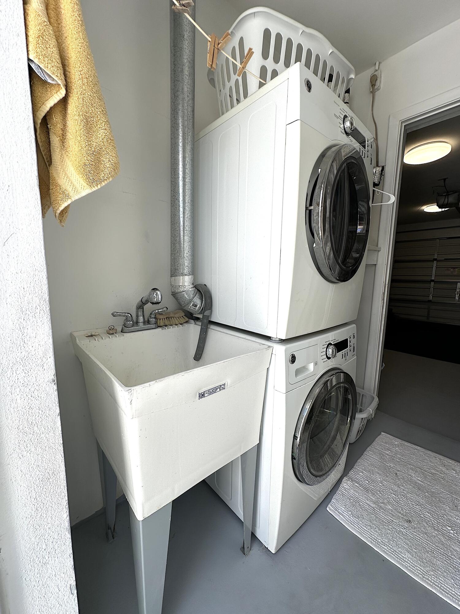 728 Ridge Road, Unit 35 Lantana, FL 33462 - Photo 35 of 35 a utility room with dryer and washer