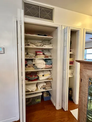 a refrigerator freezer sitting inside of a kitchen