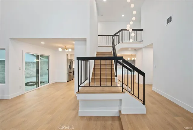 a view of gallery with wooden floor