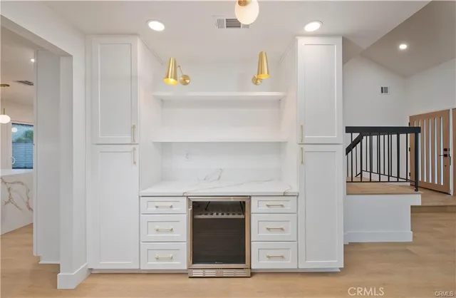 a view of a kitchen with a sink