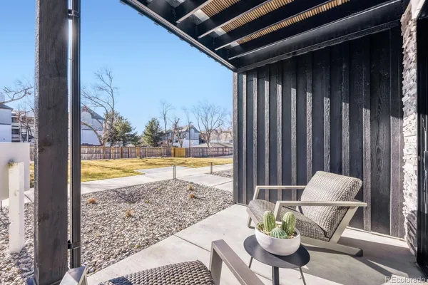 a view of balcony with furniture
