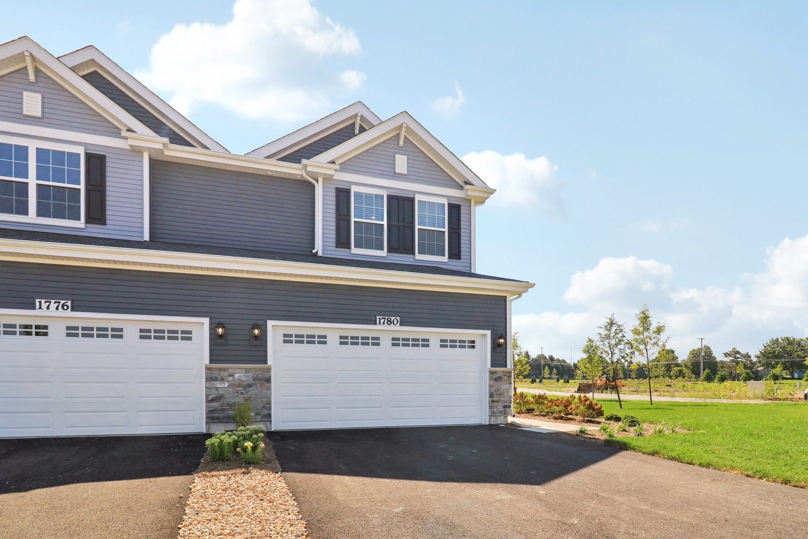 1769 Baler Avenue Aurora, IL 60503 - Photo 2 of 36 a view of a house with a yard and potted plants